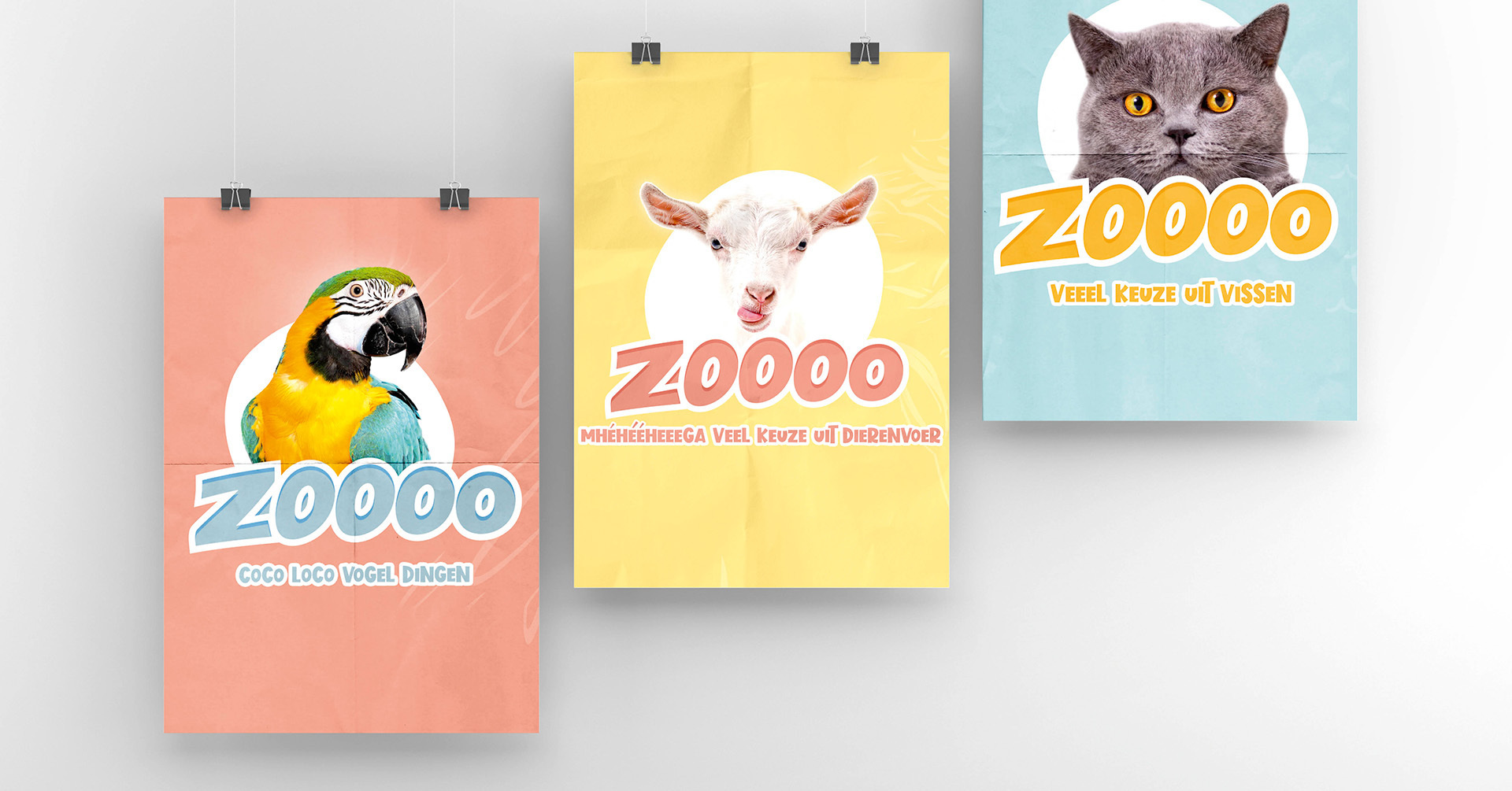 Drie affiches van de Zoo campagne met een papegaai, geit en britse korthaar kat
